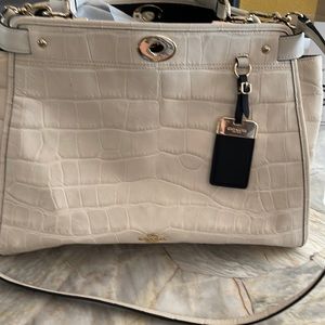 Beautiful bone colored Coach all leather handbag/tote